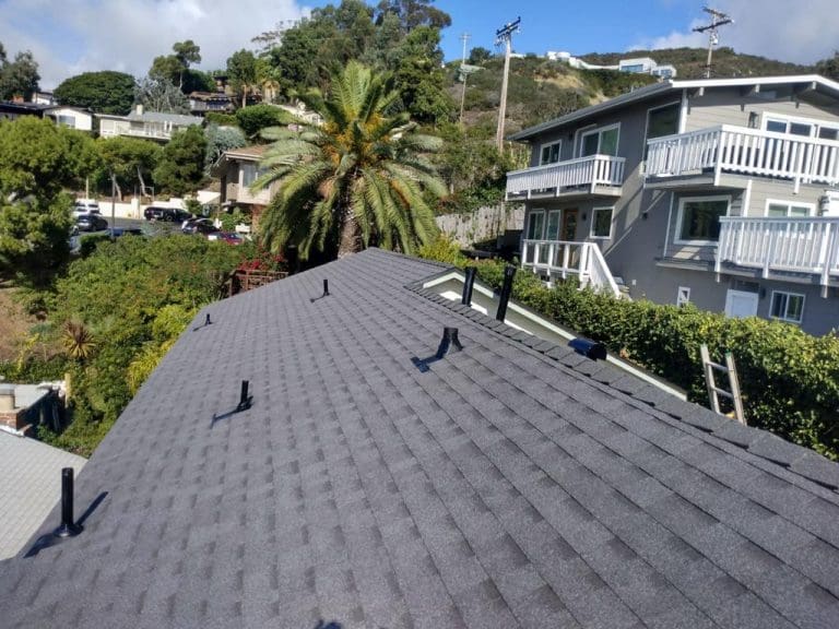 an image that represents new roof installation with shingles