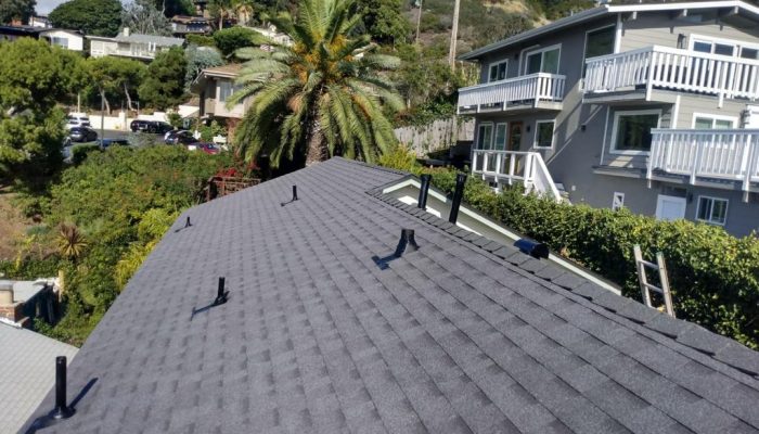 fcf909b8-83dc-4963-b781-31f272c64d96 an image that represents new roof installation with shingles